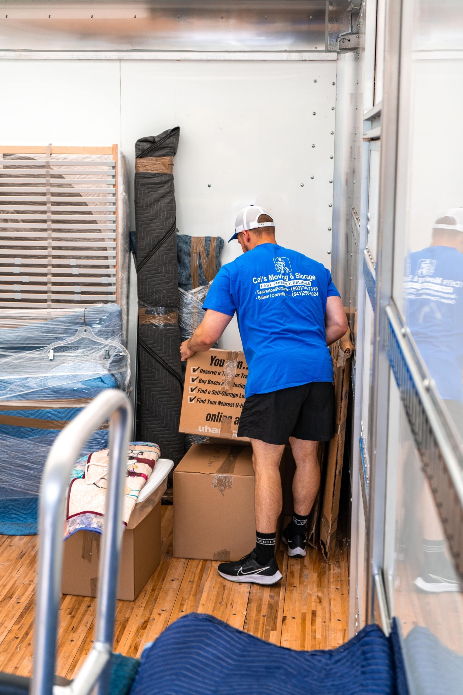 Cal's Moving crew sorting belongings during a senior relocation